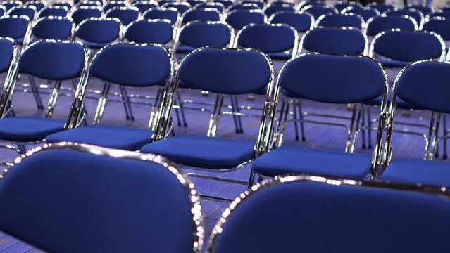 close-up of empty blue seats