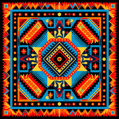 print design in the style of ethnic carpet patterns, Aztec art and African textile designs. Red blue yellow orange