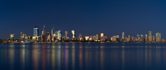 Panoramic view of downtown Perth, Australia, with sunset light reflecting off the skyscrapers - 2021