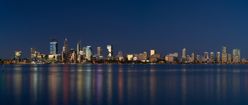 Panoramic view of downtown Perth, Australia, with sunset light reflecting off the skyscrapers - 2021