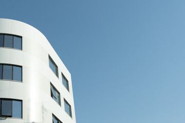 New building architecture on blue sky background,Low angle architectural exterior view of modern,copy space foe text