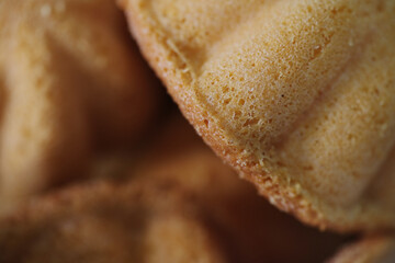 Bahulu or baulu is a traditional Malay pastry. It is similar in concept to the madeleine cake