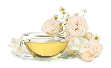 Aromatic herbal tea in glass cup and flowers isolated on white