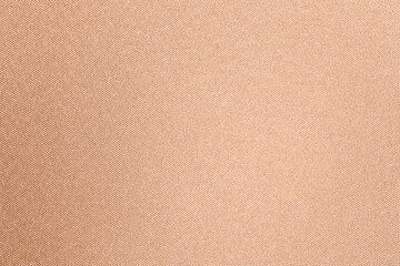Peach fuzz color fabric, top view. Trendy shade of 2024 year