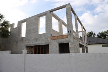 Two-Story Block Home Under Construction in Tight Space