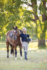 Equestrian Youth Teen Hunter Jumper riding attire with horse