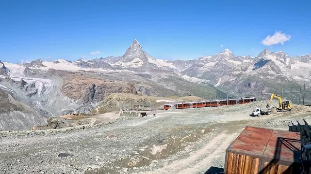 Famous alpine cogwheel Gornergrat railway in the Zermatt ski resort in the Alps in Valais, Switzerland on a sunny winter day
