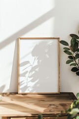 Mockup empty, photo frame, on a wooden table, with plants beside, minimal and clean style , 2:3