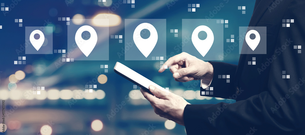 Aufkleber map pin concept with businessman using a tablet computer