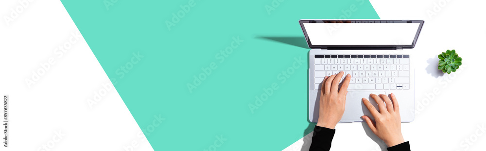 Sticker person using a laptop computer from above