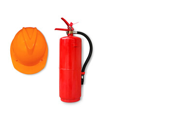Obraz premium Fire extinguisher and safety helmet on the white wall