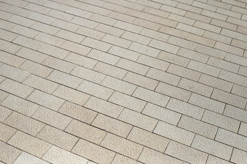 Brown tile floor walkway.Tiled courtyard
