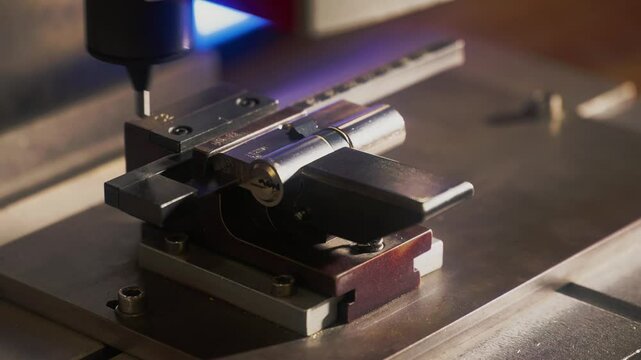 A lock being engraved by a machine p2