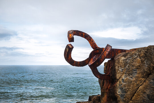 Rusty sculpture Peine del viento at San Sebastian's shore 