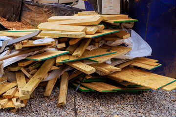 In construction house, garbage metal containers are used to dispose of construction waste