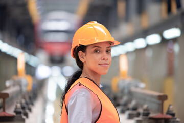 Female Locomotive Engineer in Train Depot