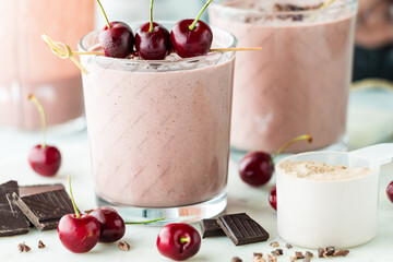 Delicious and creamy cherry chocolate protein smoothies, ready for drinking.