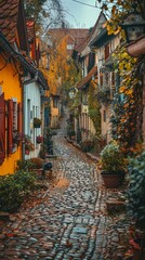 A narrow cobblestone street in a European village. AI.