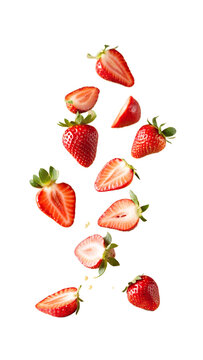 Sliced ​​strawberries float in the air