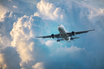 Airplane flying in the sky preparing to land at the airport. Air travel and traveling abroad	