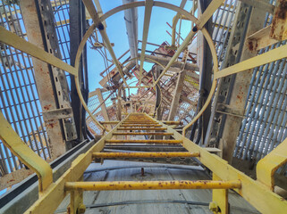 tangga monyet or Monkey ladders or vertical ladders are used to raise high vessels, drums or tanks in industrial factory areas