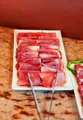continental breakfast buffet station, ham and salami