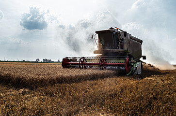Agricultural yellow field machinery landscape background