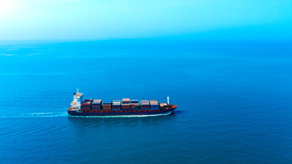 Aerial view of the freight shipping transport system cargo ship container. international...