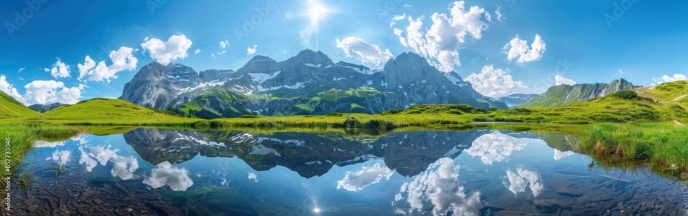 Wall mural Mountain Lake Reflecting Clouds and Peaks on a Sunny Day