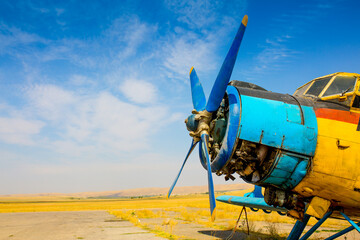 Repair and maintenance of propeller-driven aircraft. Engineers are repairing small aircraft.