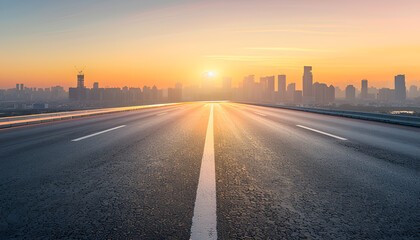 Modern Cityscapes of big city with Open Road at Sunrise