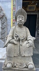 Statues inside Grand Palace Bangkok.Closeup of the architecture inside the Grand palace Bangkok Thailand. Buddhist temple building of Thai royal  is a place of visit for local and foreign tourists.