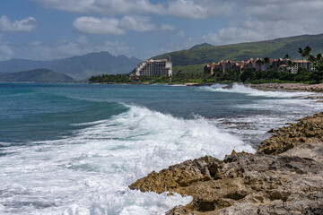 Ko Olina Beach Park, Leeward Coast of Oahu, Honolulu, Hawaii, Pacific Ocean. Beachrock is a friable...