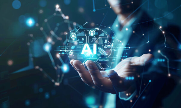 Artificial intelligence concept with business man holding hologram icon of artificial smart technology and data elements on virtual screen background, text "AI" - Powered by Adobe