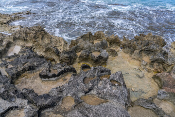  Ko Olina Beach Park, Leeward Coast of Oahu, Honolulu, Hawaii geology. Beachrock is a friable to well-cemented sedimentary rock. Salt weathering Tafoni
