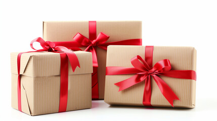 Obraz premium gift box wrapped with brown paper and red ribbon isolated on white