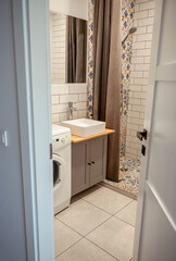 white rectangular sink and faucet in the bathroom