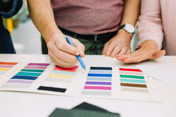 People choosing fabric swatch color palette