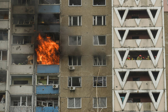 Black smoke is rising from a burning residental building damaged by a massive Russian missile strike in Kyiv, Ukraine, on February 7, 2024