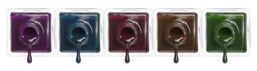 Nail polish of different colors dripping from bottles on white background, collection