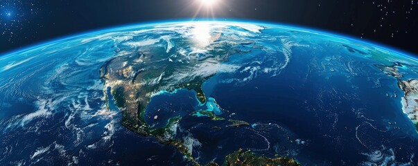 A beautiful view of the Earth at night, with the sun shining brightly in the sky. The blue and white colors of the sky and the Earth create a serene and peaceful atmosphere