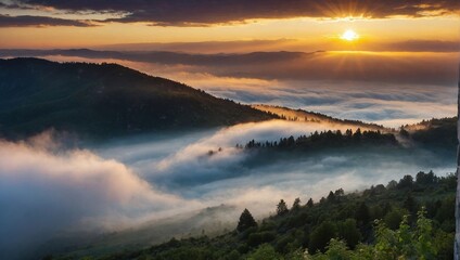 Pleasant sunrise in the mountains shrouded in fog