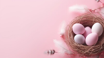 Pink and white Easter eggs in a nest of straw on a pink background.