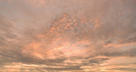 Panoramic view of sunset golden and blue sky nature background.
Colorful dramatic sky with cloud at sunset.Sky background.Sky with clouds at sunset.