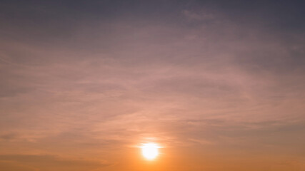 Panoramic view of sunset golden and blue sky nature background.
Colorful dramatic sky with cloud at sunset.Sky background.Sky with clouds at sunset.