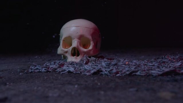 Skull with ashes blowing in wind