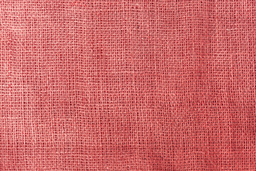 texture fabric burlap for sewing red background color macro