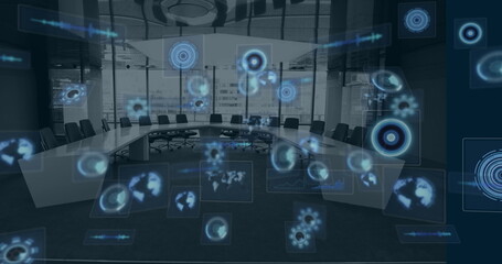 Image of multiple round scanners and data processing against empty office
