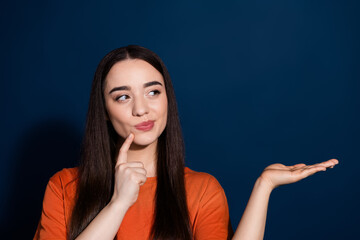 Photo of lovely cute gorgeous woman wear stylish clothes look empty space isolated on dark blue color background