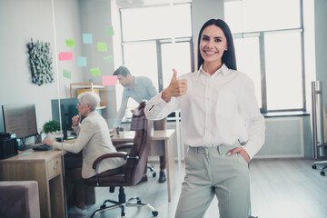 Obraz premium Photo of confident business people woman make thumb up sign advetise company vacancy